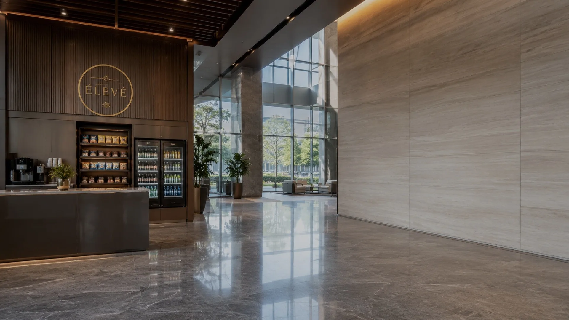 Bright building lobby with an ÉLEVÉ installation